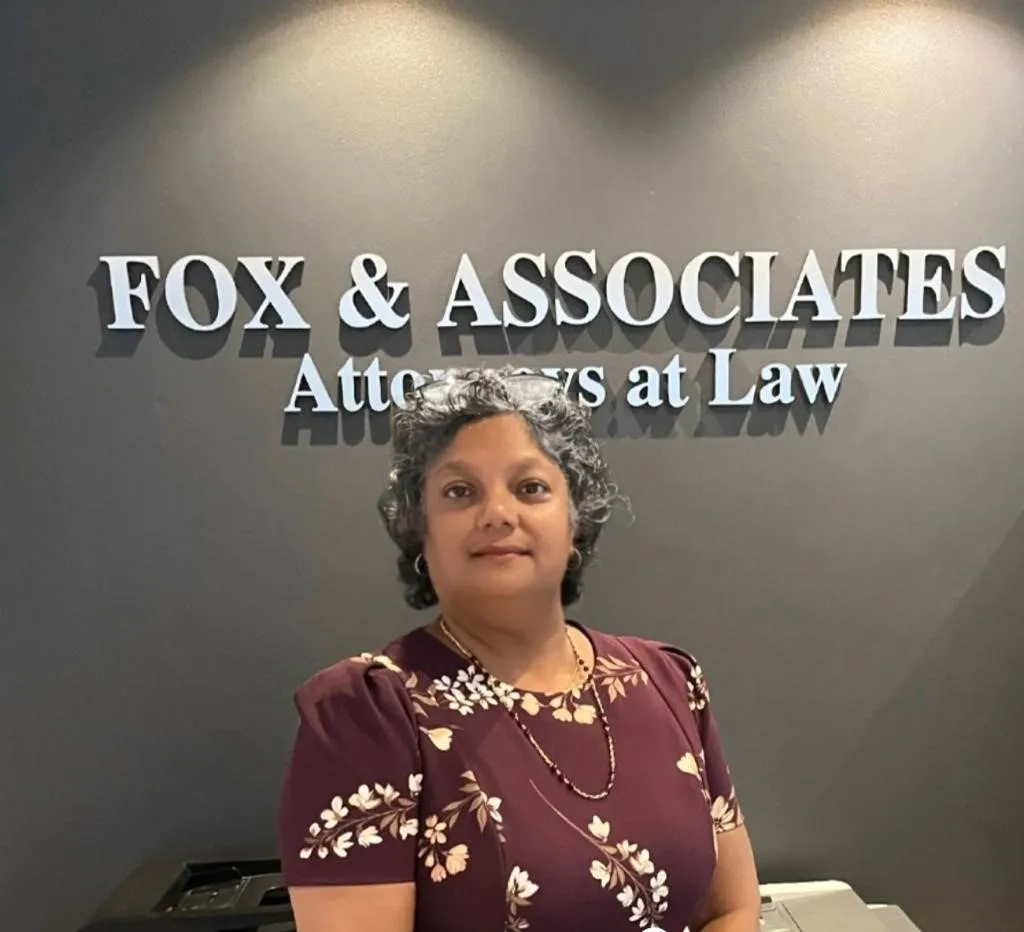 A person standing in front of fox and associates attorneys